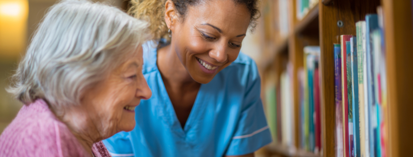 A happy woman with her caregiver providing home care services in Blackpool