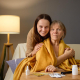 care at home after hospital family carer supporting elderly woman recovering at home in Blackpool