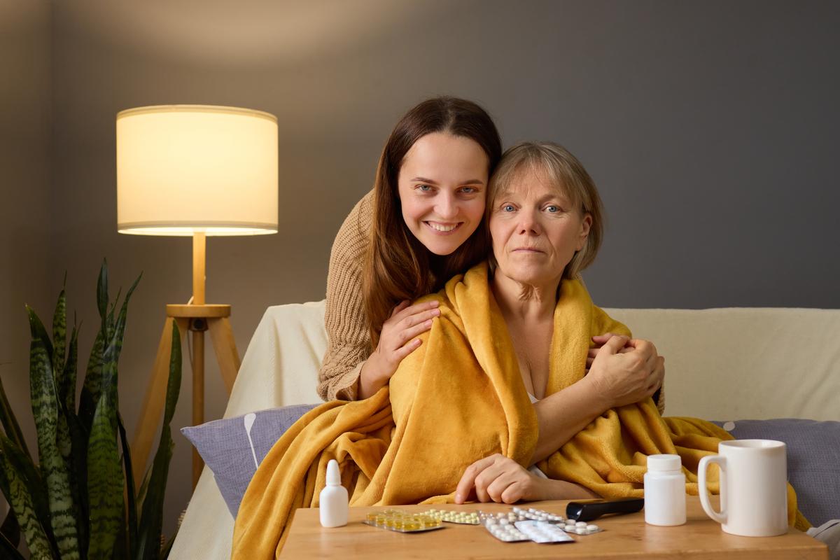 care at home after hospital family carer supporting elderly woman recovering at home in Blackpool