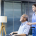 Comfort Home Care Services caregiver assisting an elderly man in a wheelchair while looking out the window at home