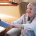 caregiver-helping-senior-woman-at-home-supported-living-and-domiciliary-care-concept