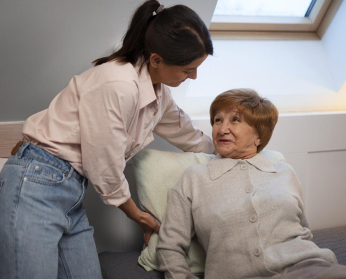 female-caregiver-giving-night-care-for-the-elderly-person (1)