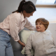 female-caregiver-giving-night-care-for-the-elderly-person (1)