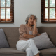 signs your loved one needs extra support at home - adult child checking on elderly parent