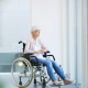 A care professional supporting an elderly woman using the dementia training standards framework to promote dignity and emotional wellbeing at home