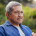 Elderly man on bench outdoors — why is dementia training important for families