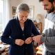 A man providing dementia support at home for an elderly person in Cockerham Lanchashire