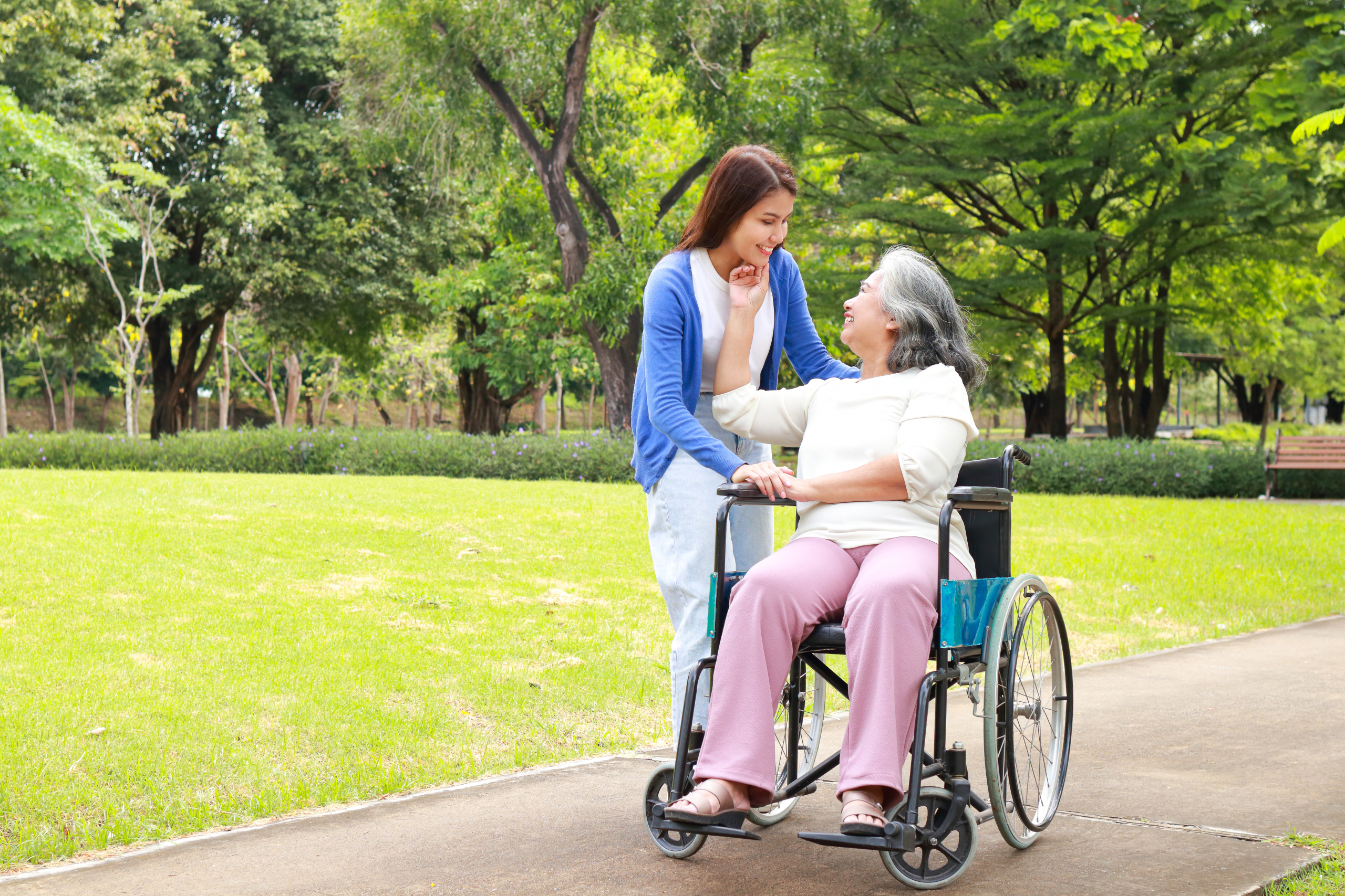 emotional-well-being-home-care-lancashire Carer and elderly woman sharing a warm conversation at home to support emotional well being