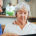 A carer and elderly woman sharing a conversation during a private companion visit at home in Lancashire, private companion for elderly near me.